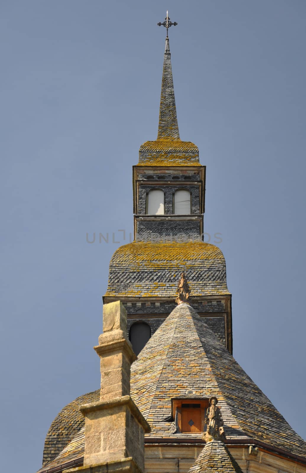 The graduated roof of the Basilique St Sauveur, Dinan in Brittany, France. The church is a mixture of Romanesque & Byzantine styles, and is unique in Britanny