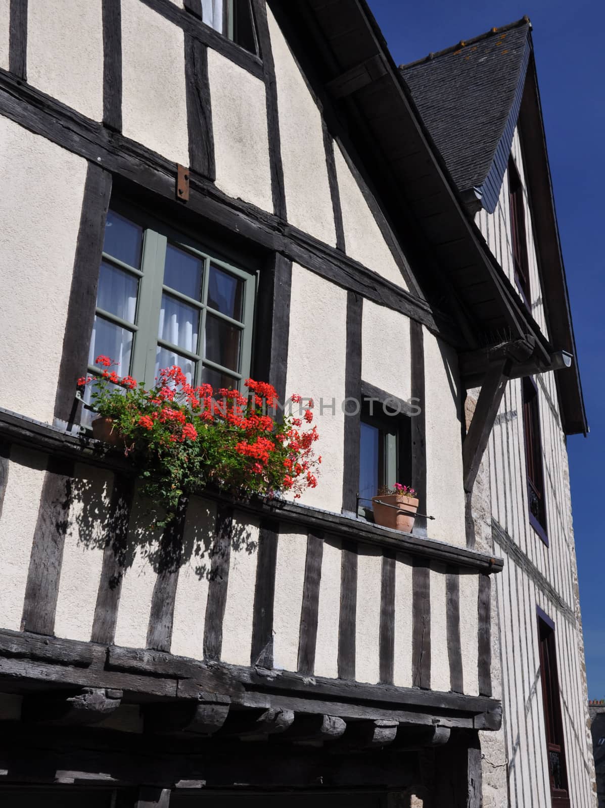 Medieval half-timbered buildings in the ancient french town of Dinan in Brittany.