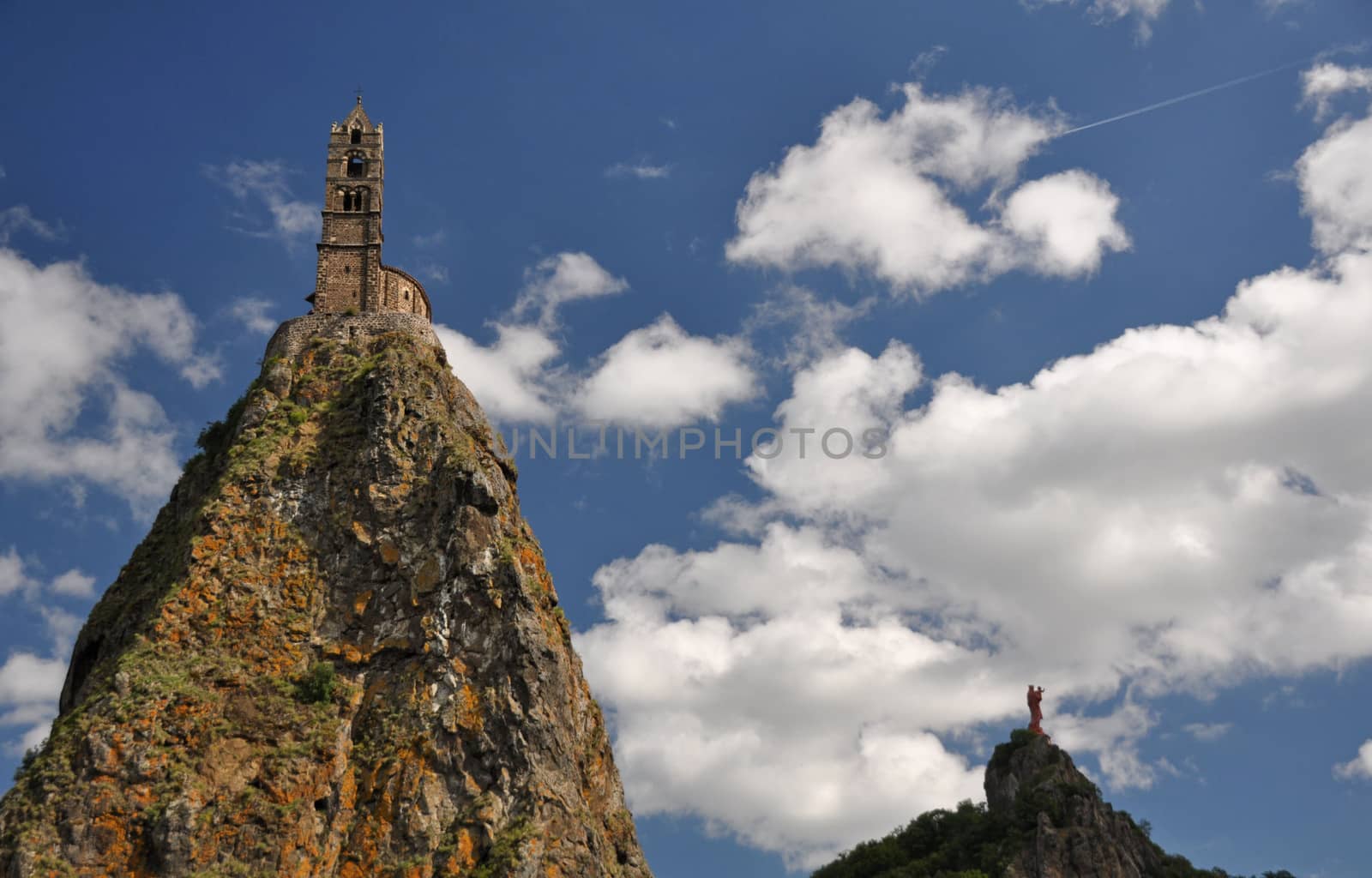 The Chapel built on the top of a needle of volcanic lava, called Rocher St Michel ( Mont d'Aiguilhe ) is one of the most impressive sights in the Auvergne, France