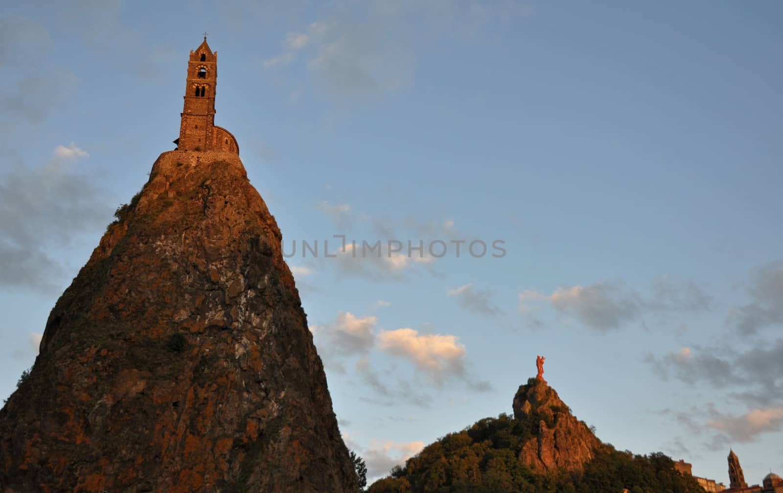 The Chapel built on the top of a needle of volcanic lava, called Rocher St Michel ( Mont d'Aiguilhe ) is one of the most impressive sights in the Auvergne, France