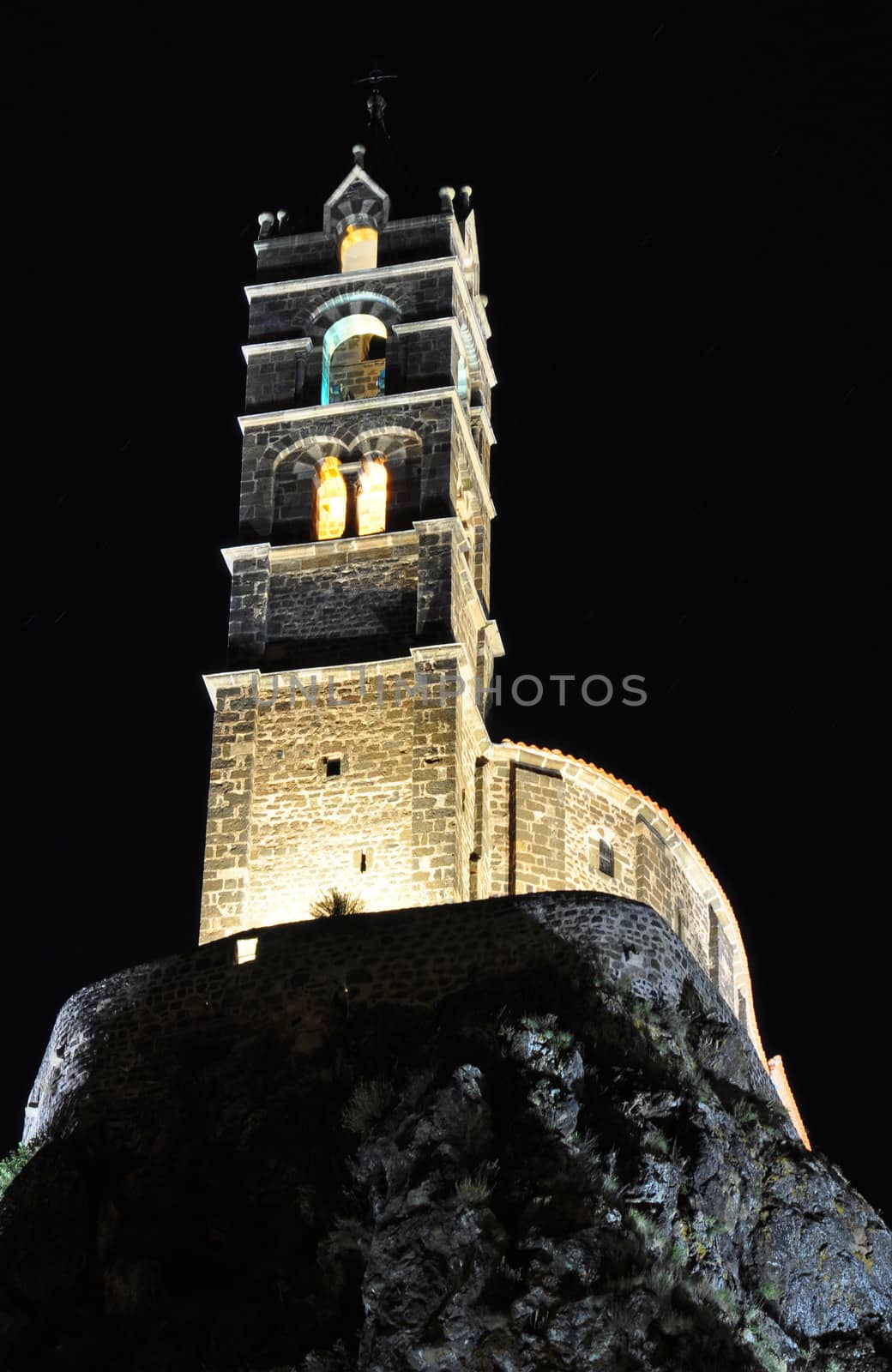 The Chapel built on the top of a needle of volcanic lava, called Rocher St Michel ( Mont d'Aiguilhe ) is one of the most impressive sights in the Auvergne, France