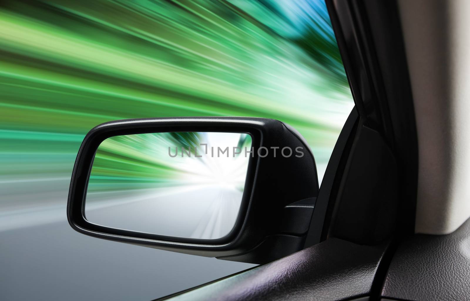 rear-view of moving car by ssuaphoto