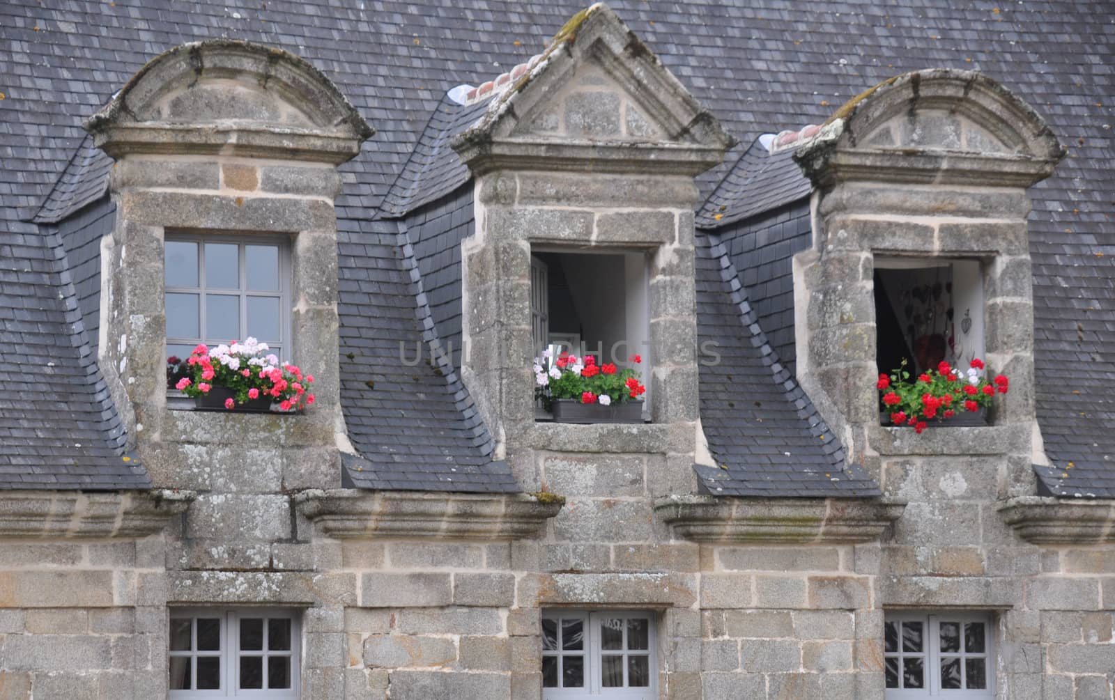 Floral display in the village of Locronan, in Brittany, rural France