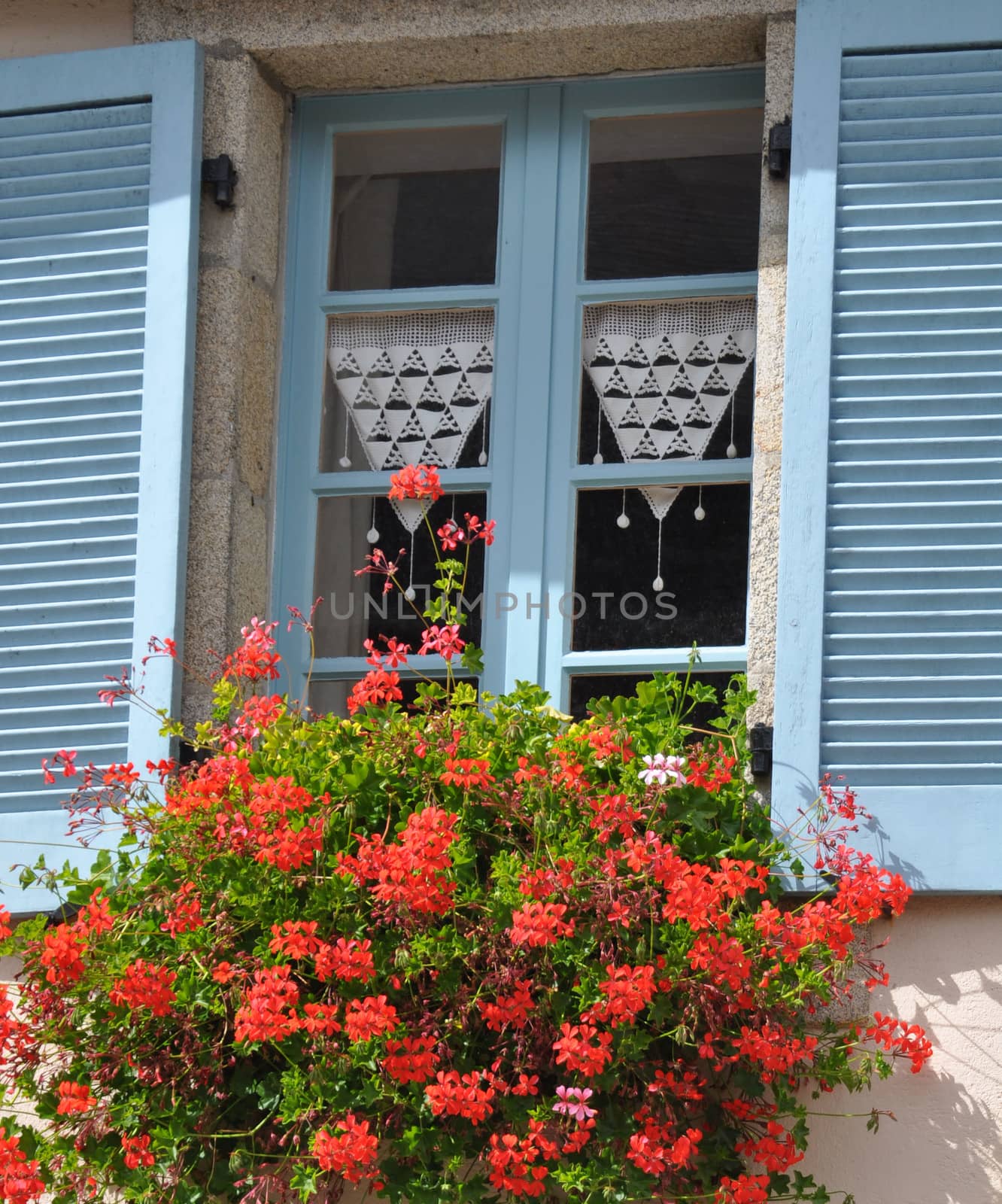 Floral display in the village of Locronan, in Brittany, rural France