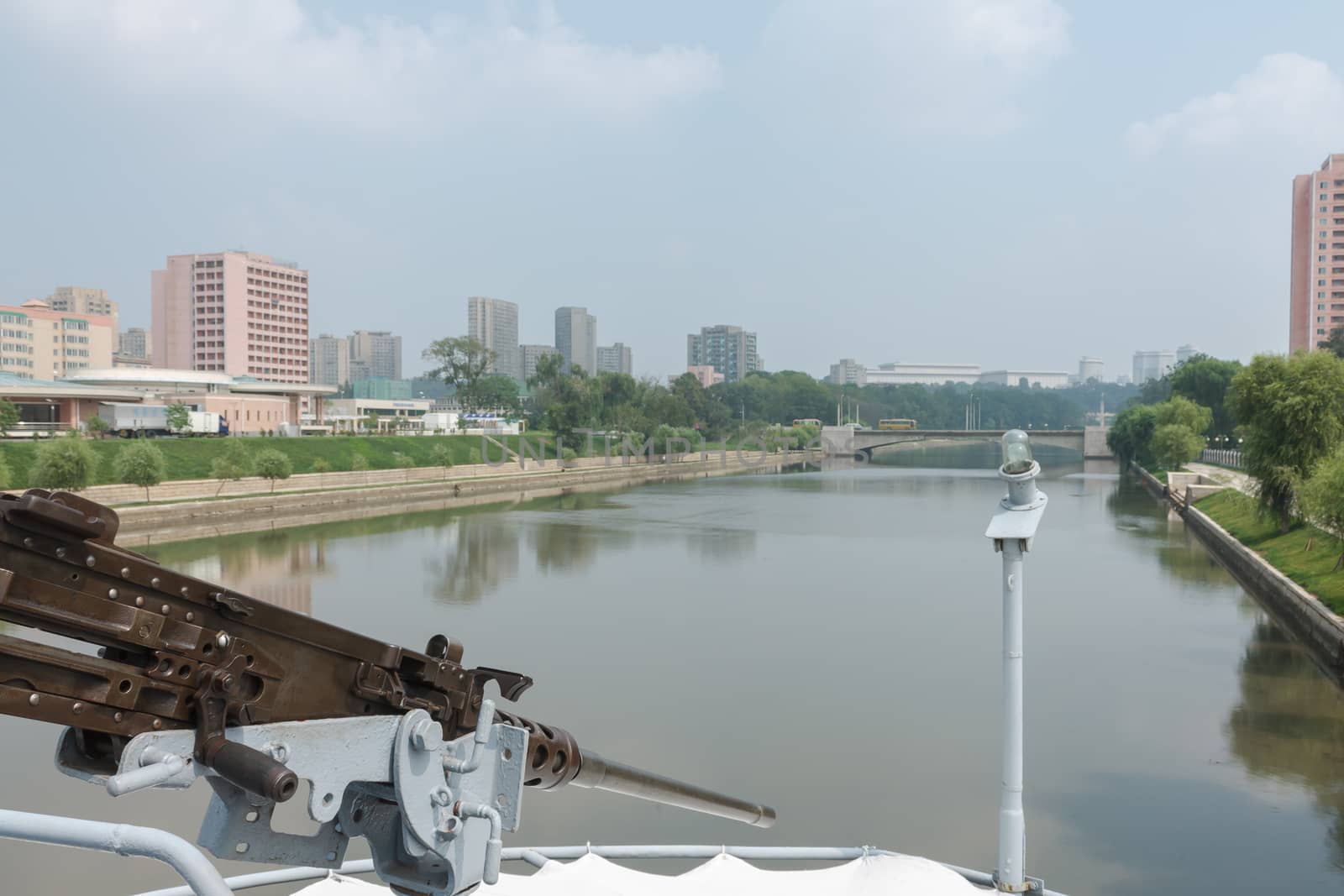 machine gun on the ship Pueblo in background Pyongyang by Mieszko9