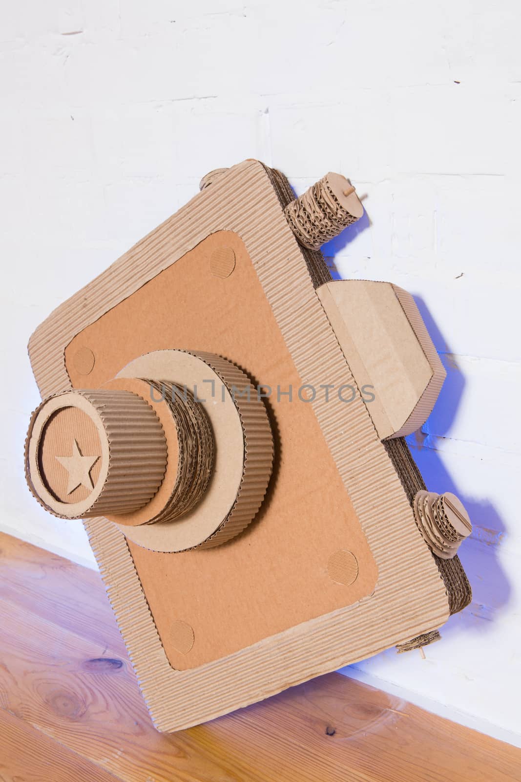 handmade cardboard camera on a white background