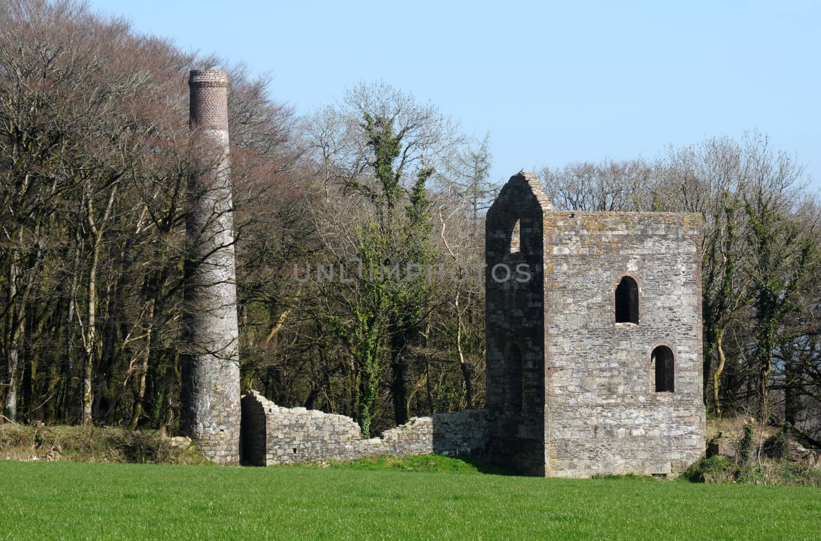 Images of old and non operating mines and their buildings .