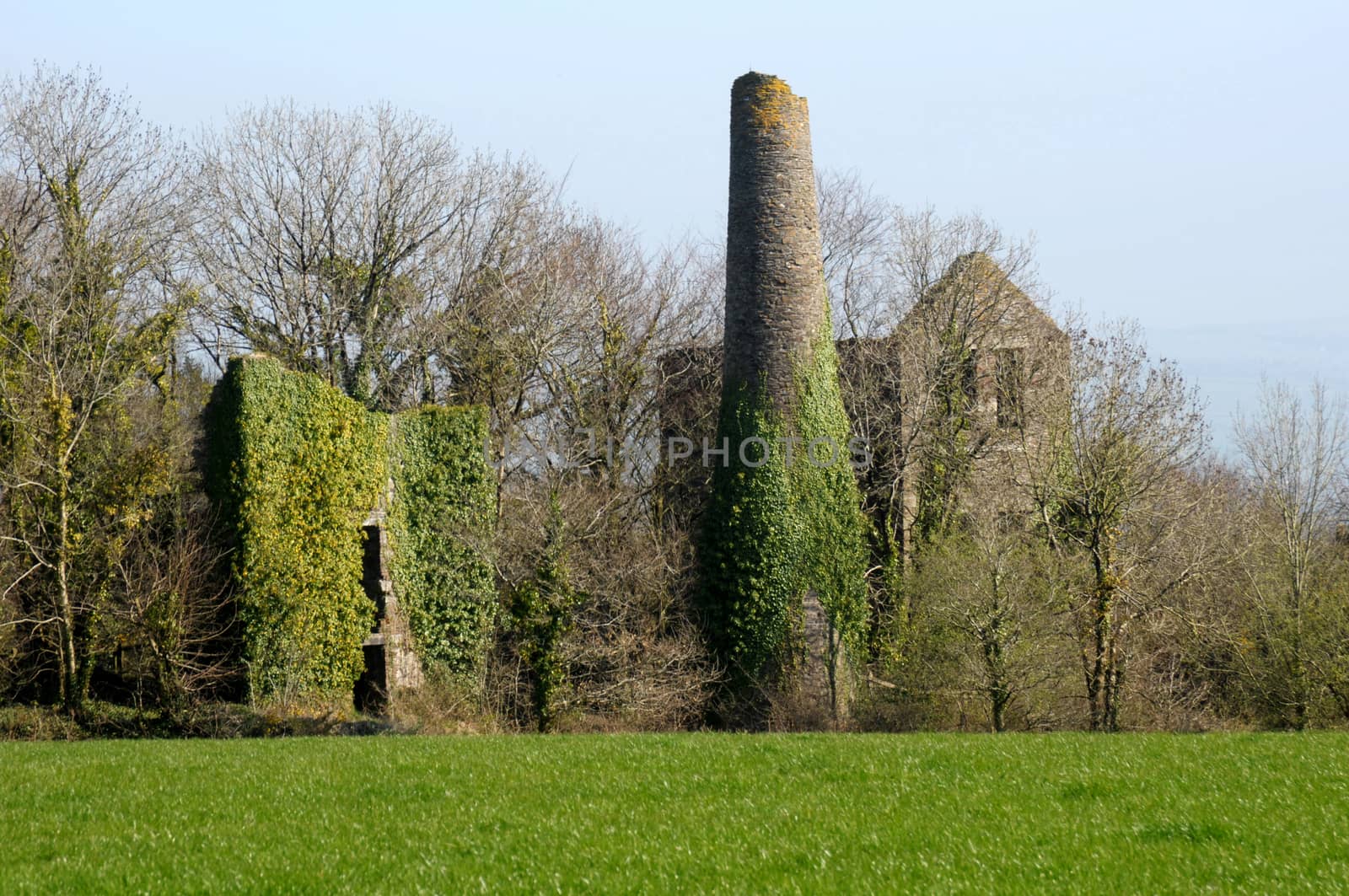 Images of old and non operating mines and their buildings .