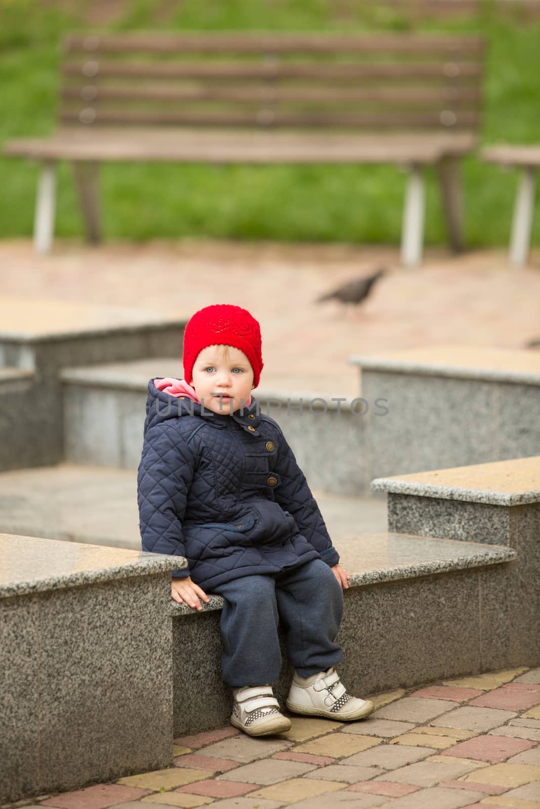 happy child walking in the park by sarymsakov