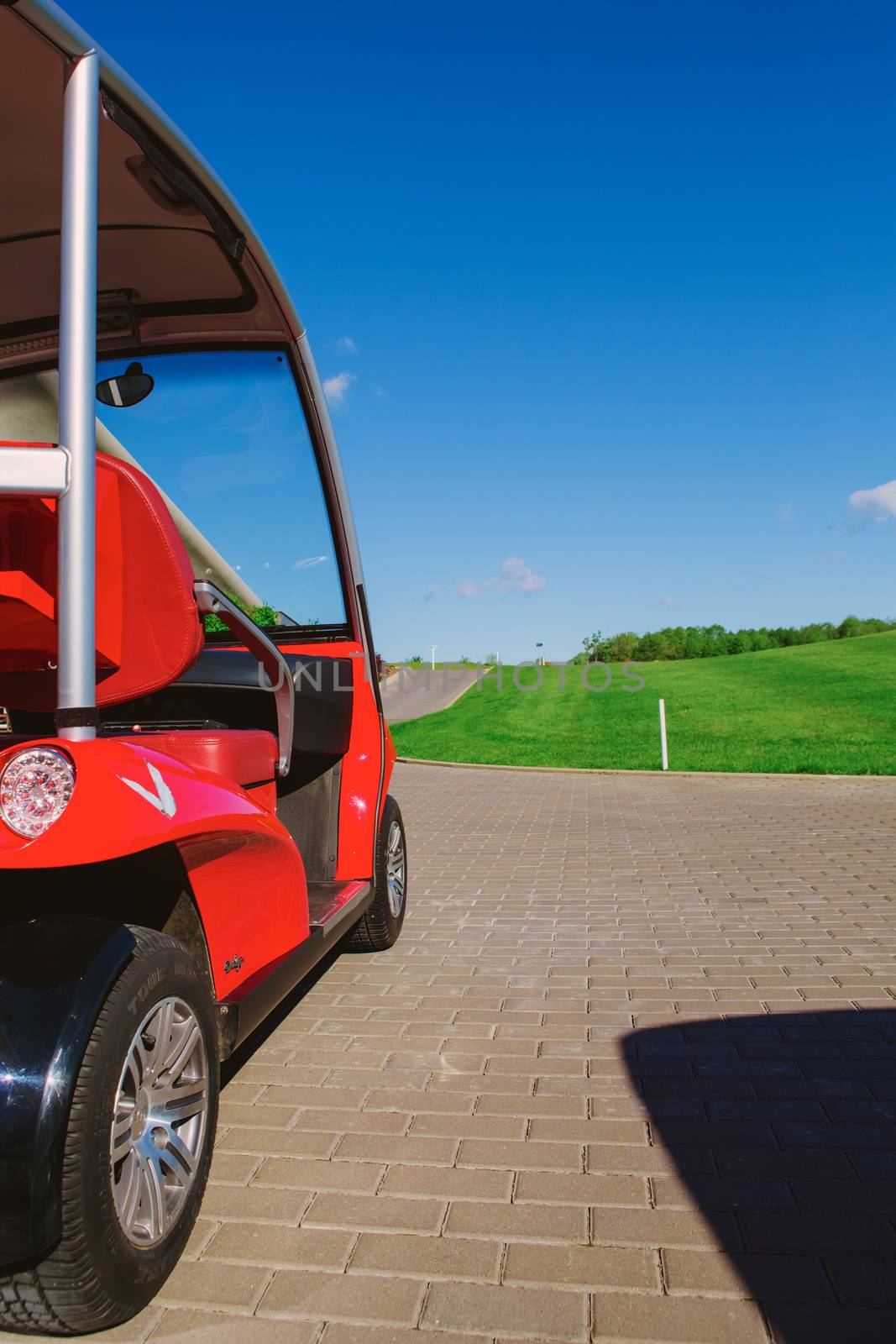 Golf car on the golf course by sarymsakov