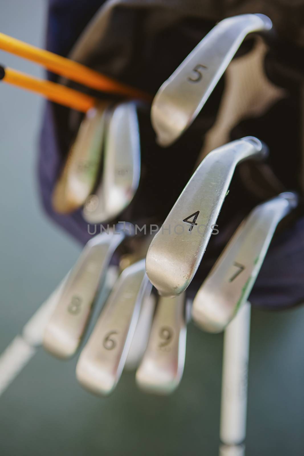Dirty golf clubs in bag. Shallow dof