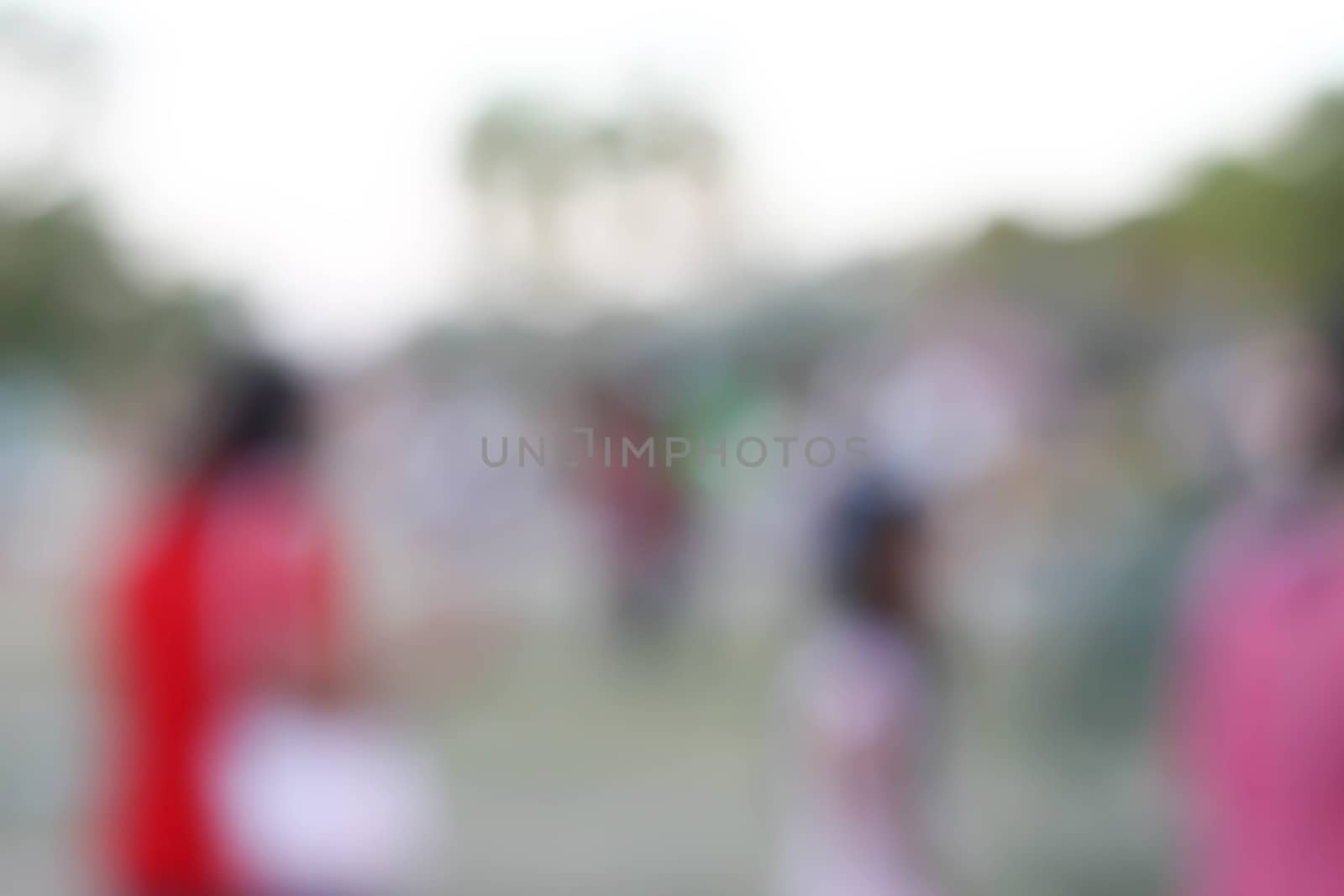 Background blur walking in festival by primzrider