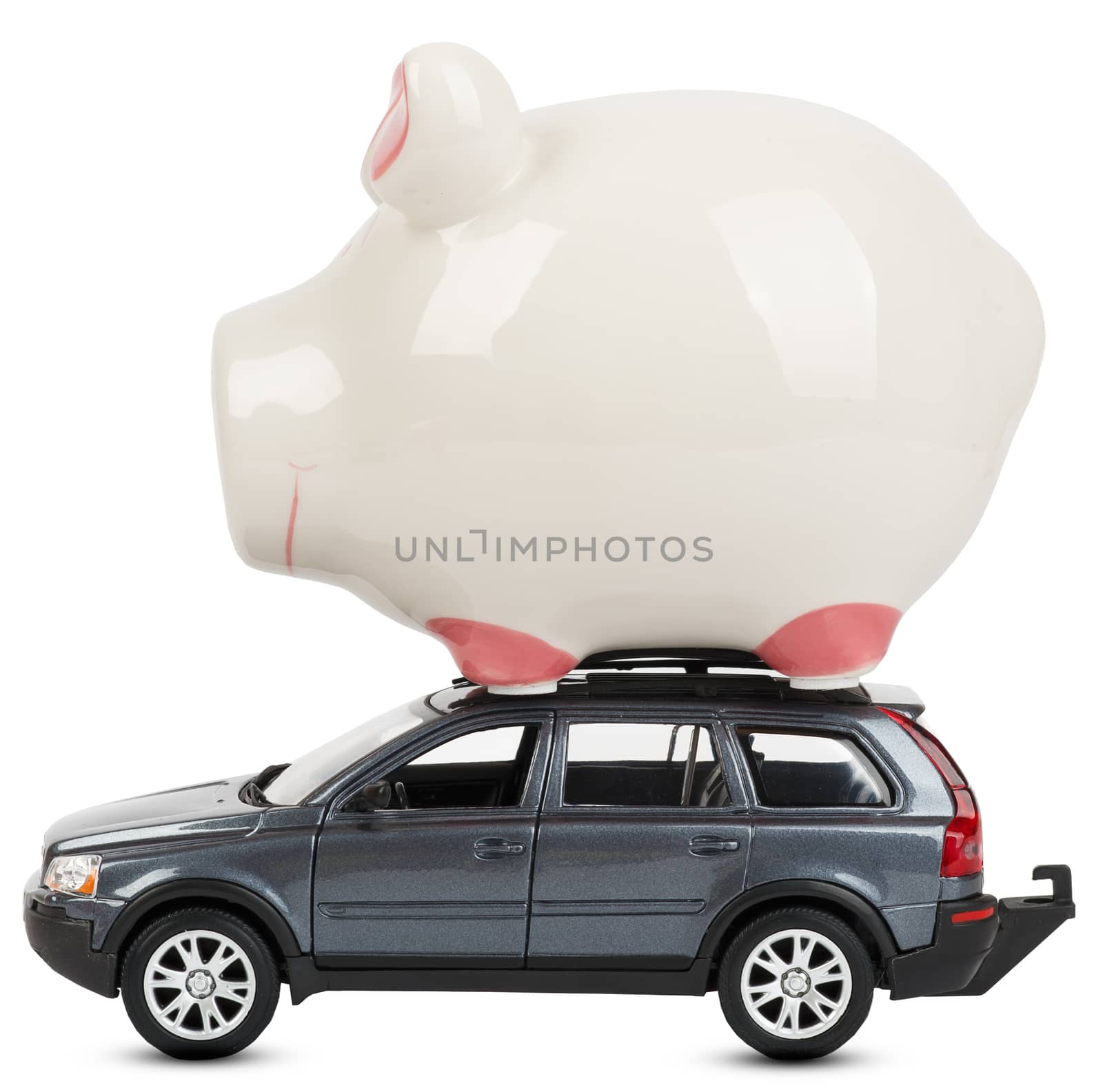 Piggy bank on car isolated on white background, side view