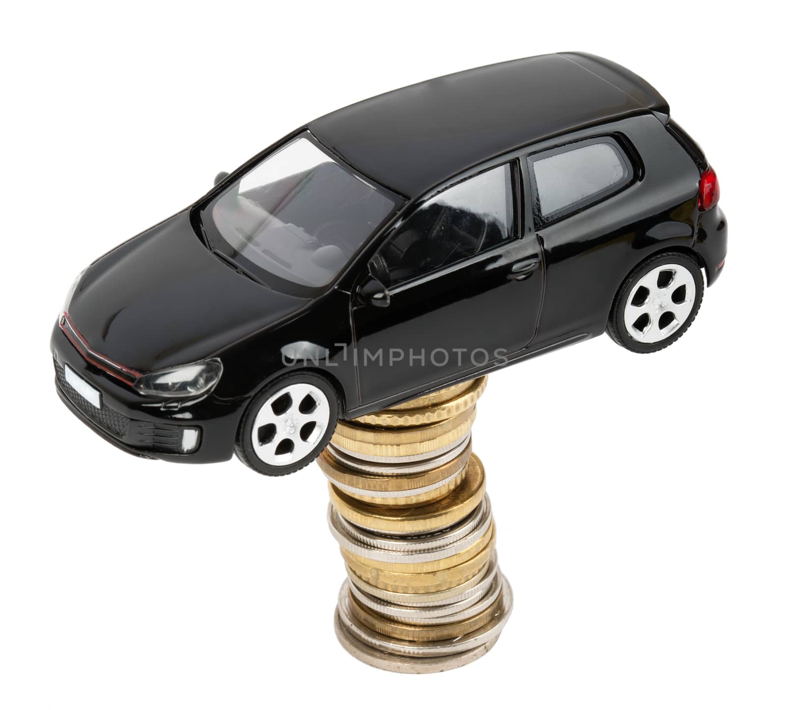 Car on stack of coins isolated on white background, top view