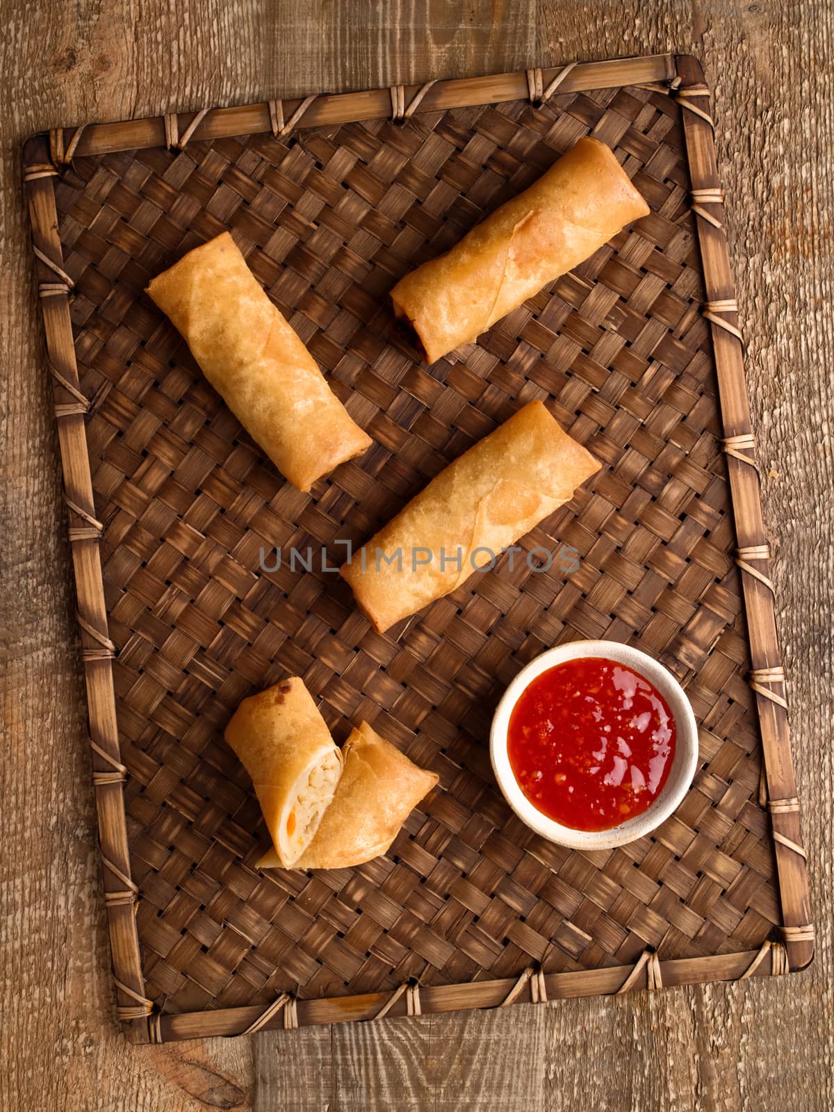 close up of rustic golden chinese spring rolls