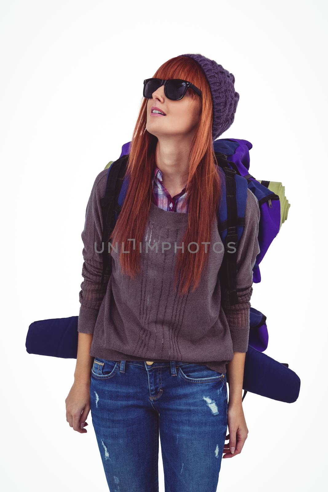 Portrait of a hipster woman with a travel bag by Wavebreakmedia