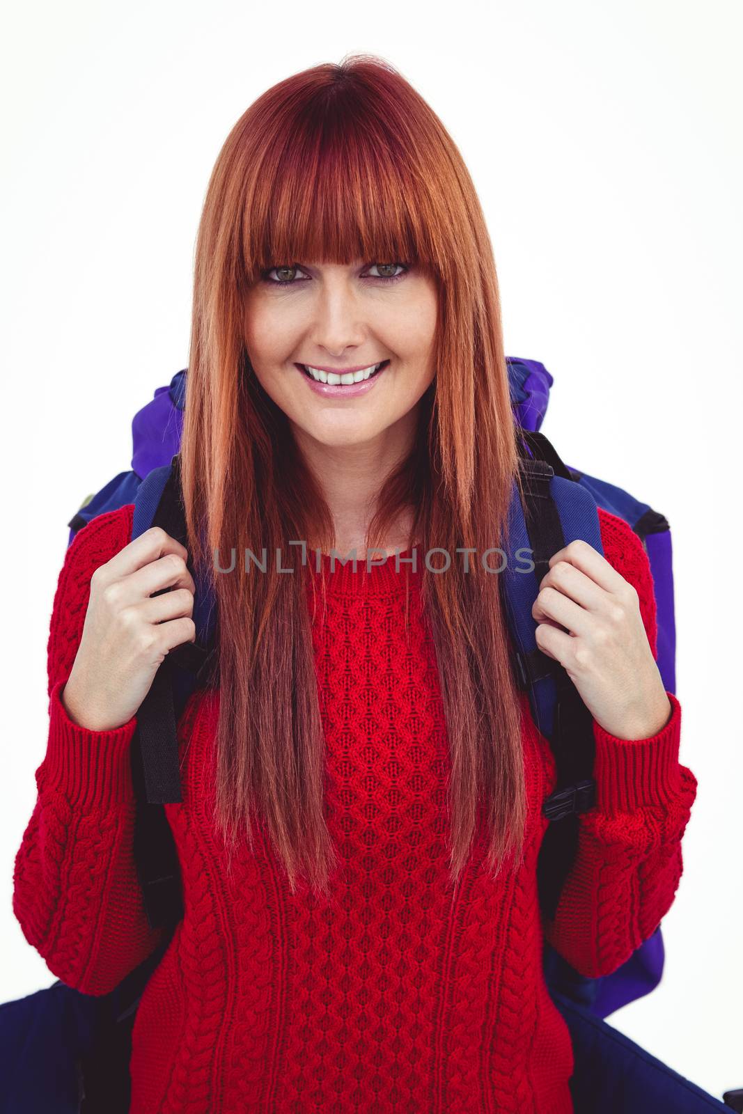 Smiling hipster woman with a travel bag taking selfie by Wavebreakmedia