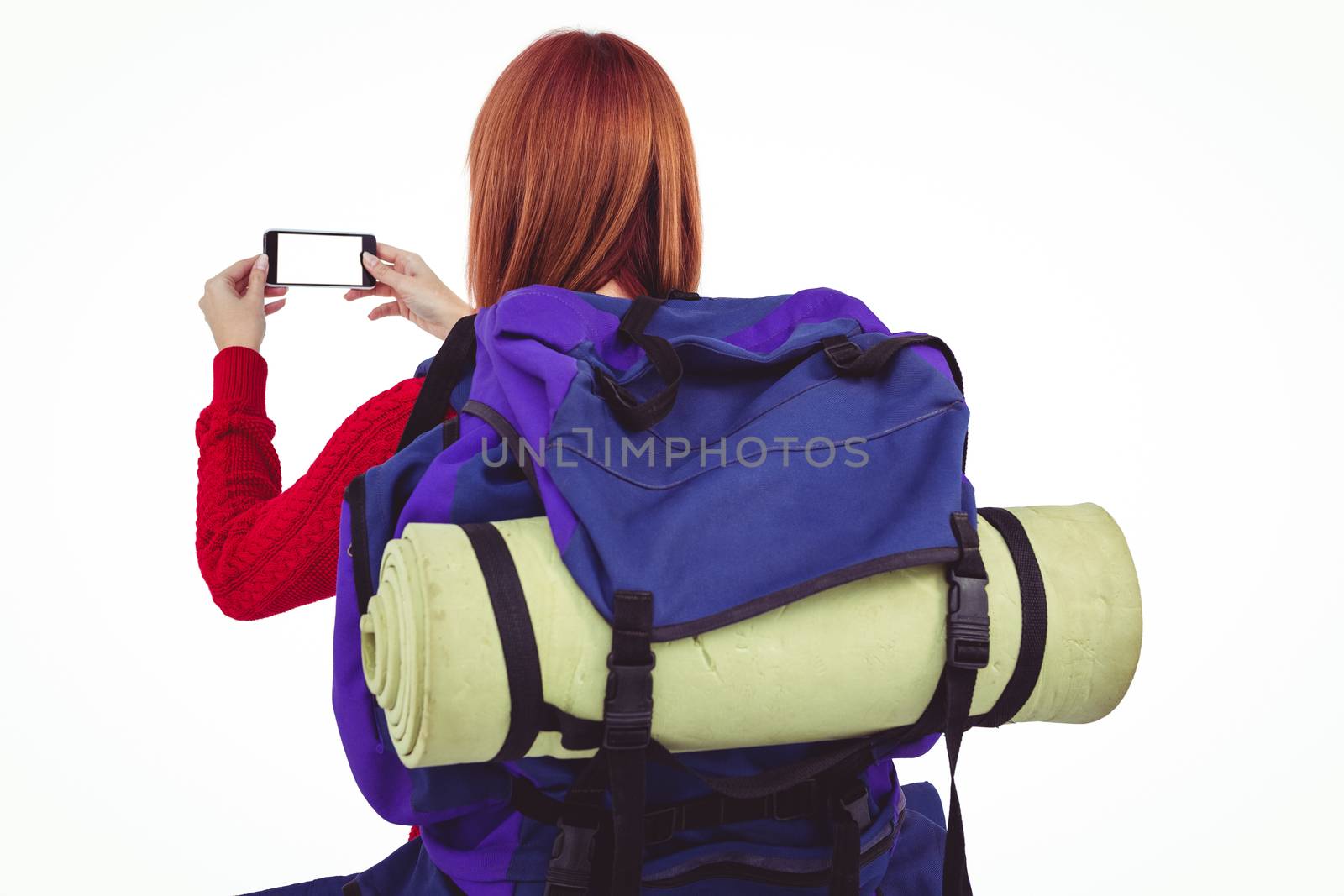 Smiling hipster woman with a travel bag by Wavebreakmedia