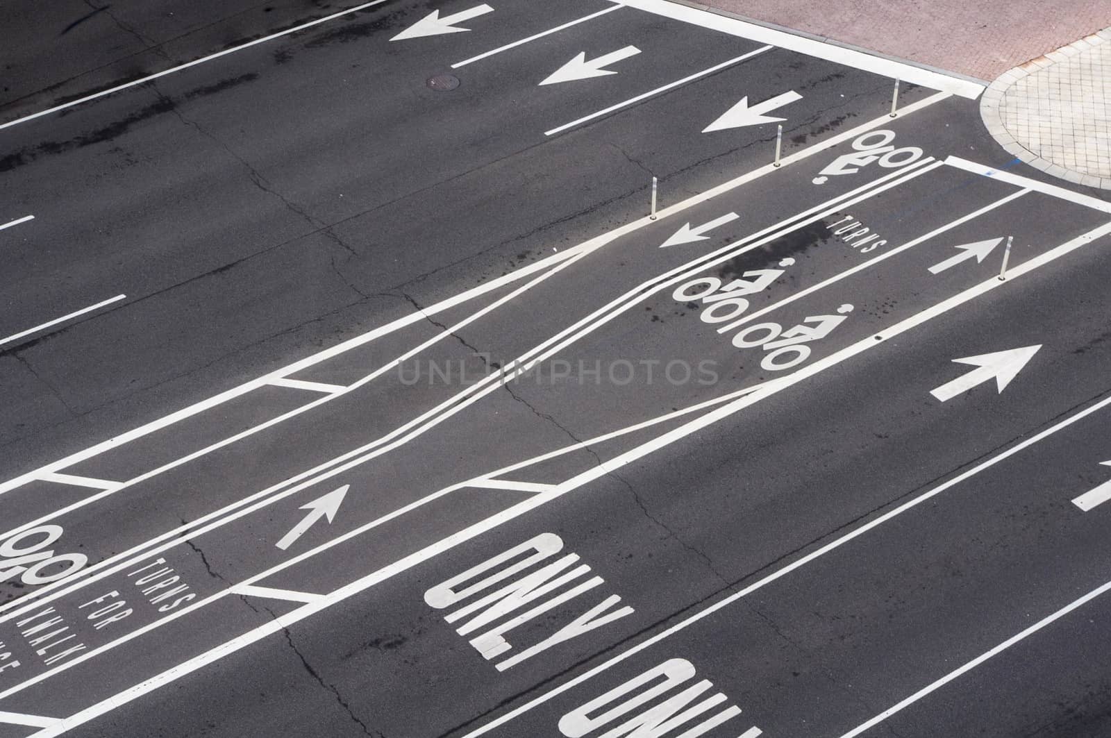 Paved road with road surface marking symbols