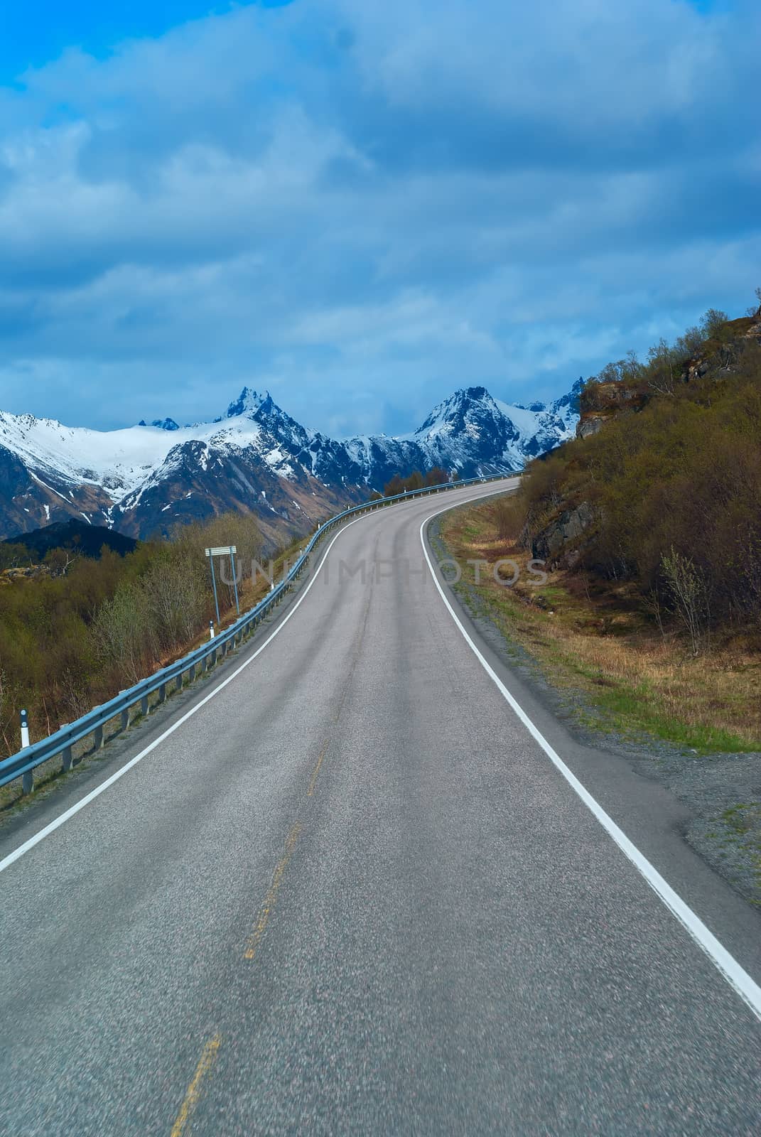 Grey road in Norvegian mountains