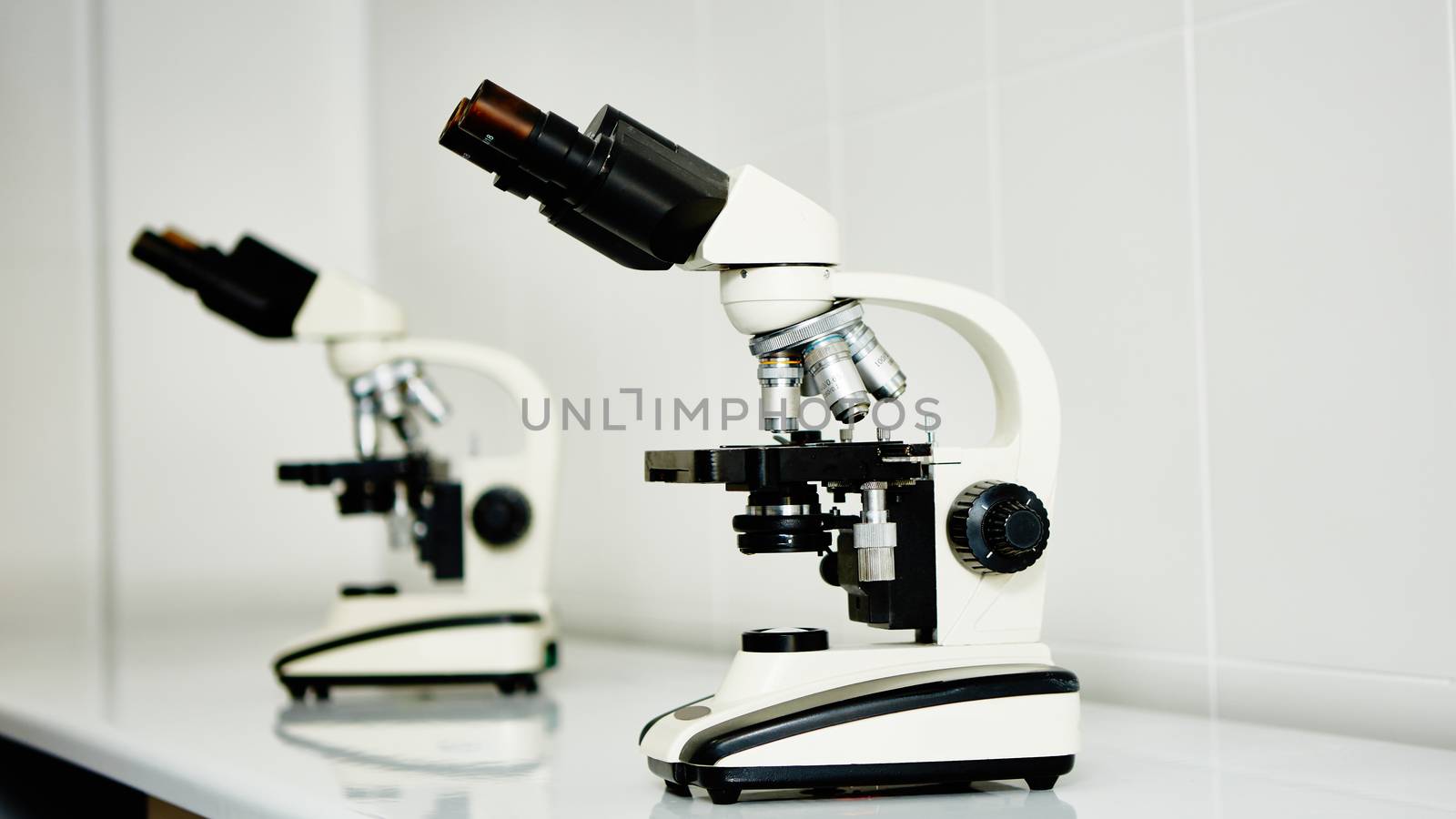 Laboratory microscope lens. modern microscopes in a lab.
