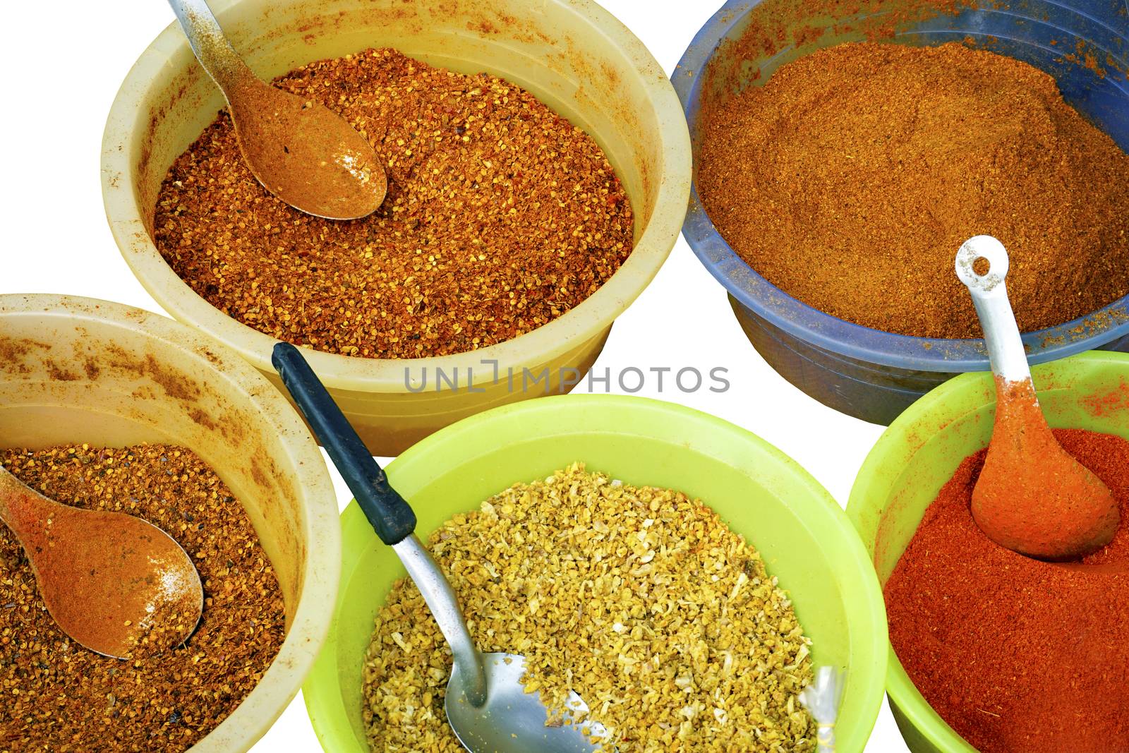colorful chili powder and spice  by polarbearstudio