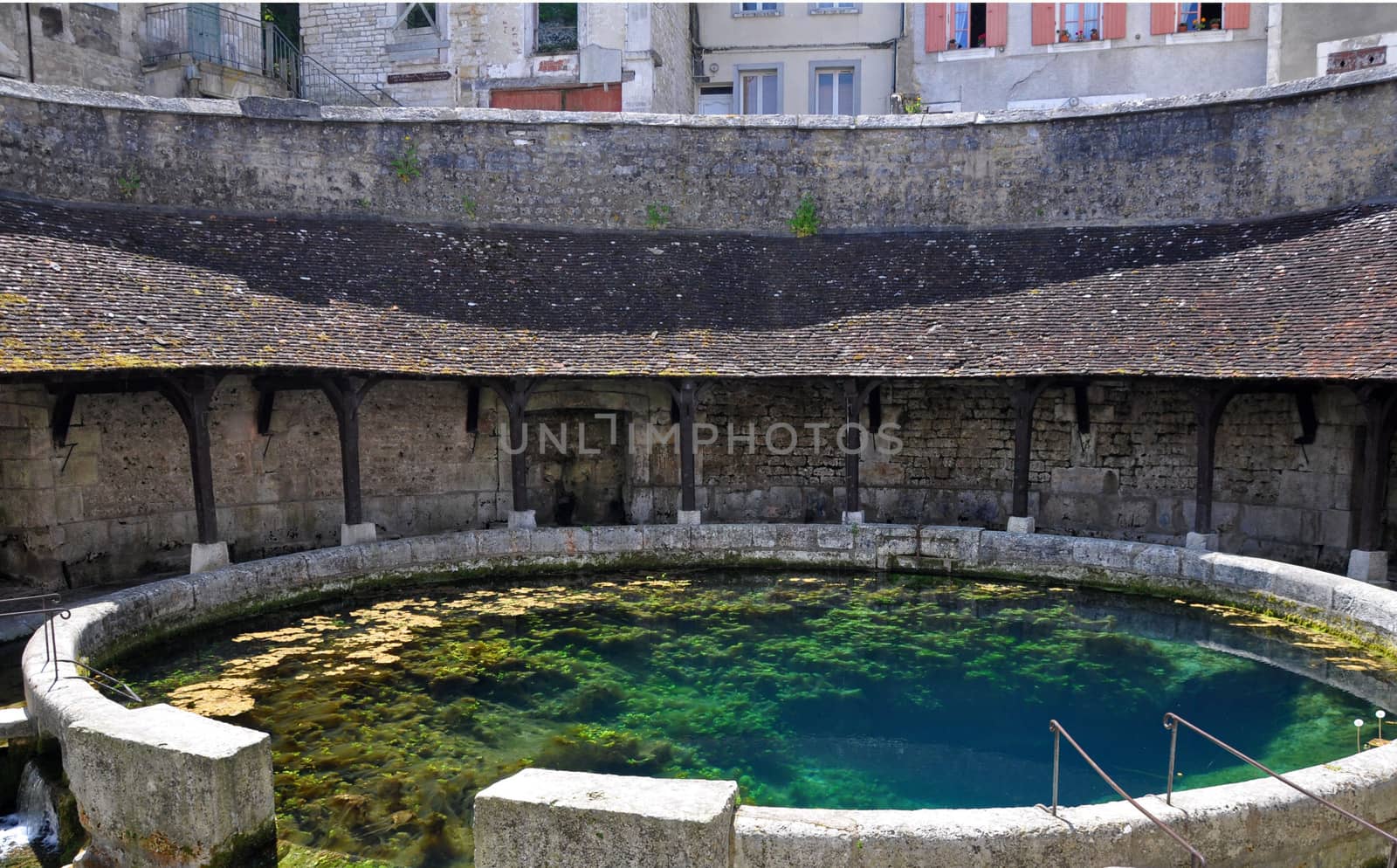 Tonnerre in the Morvan, Burgundy, France sits on the River Armancon. Famed for theTonnerre Fosse Dionne wash house