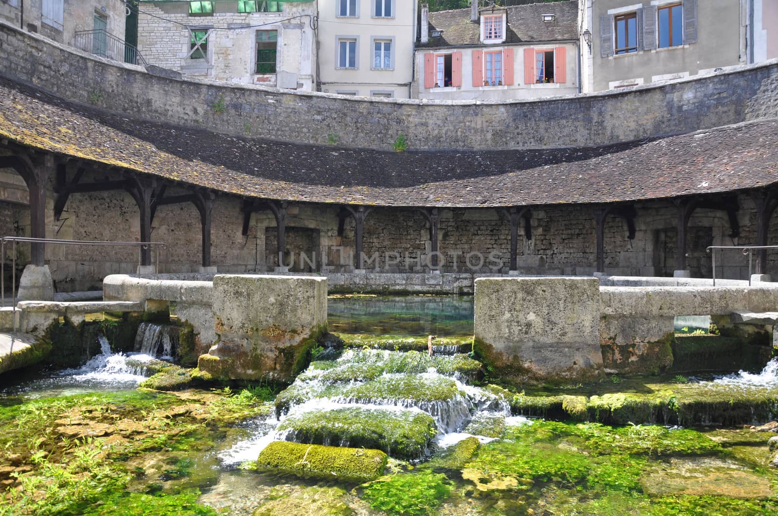 Tonnerre in the Morvan, Burgundy, France sits on the River Armancon. Famed for theTonnerre Fosse Dionne wash house