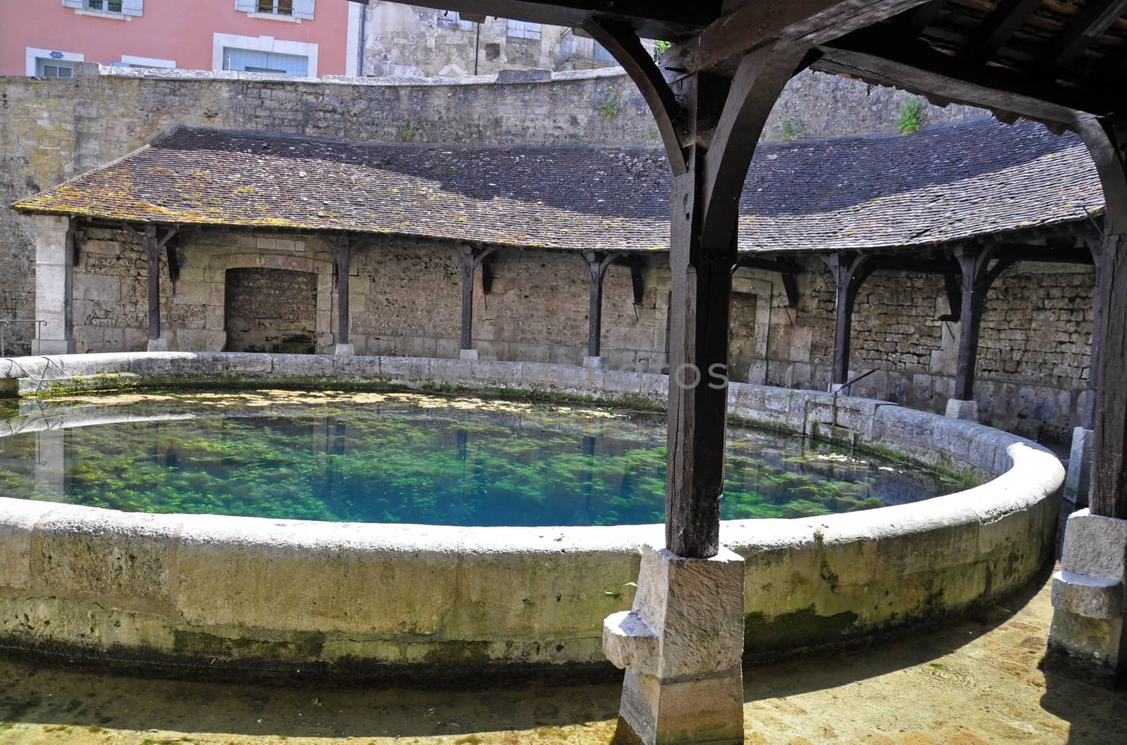 Tonnerre in the Morvan, Burgundy, France sits on the River Armancon. Famed for theTonnerre Fosse Dionne wash house