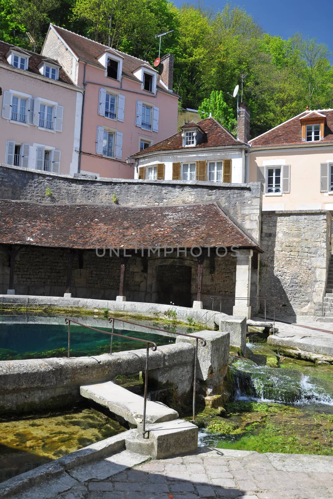 Tonnerre in the Morvan, Burgundy, France sits on the River Armancon. Famed for theTonnerre Fosse Dionne wash house