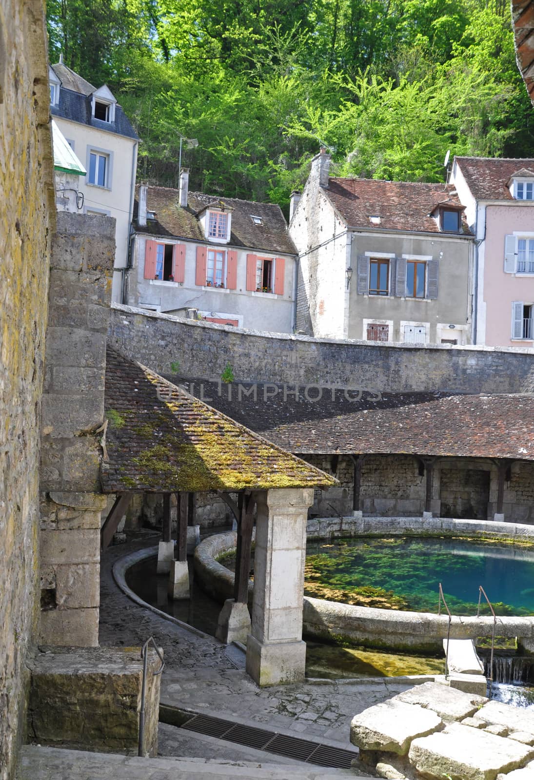 Tonnerre in the Morvan, Burgundy, France sits on the River Armancon. Famed for theTonnerre Fosse Dionne wash house