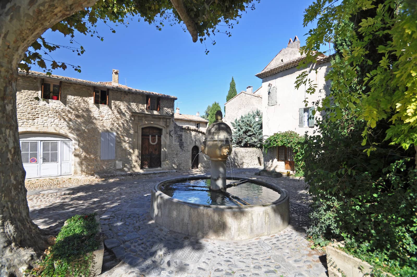Fountain in Place de Vieux-Marche and Rue des Fours, ( Haute-Ville) at Vaison La Romain, in the Vancluse, Provence, France.