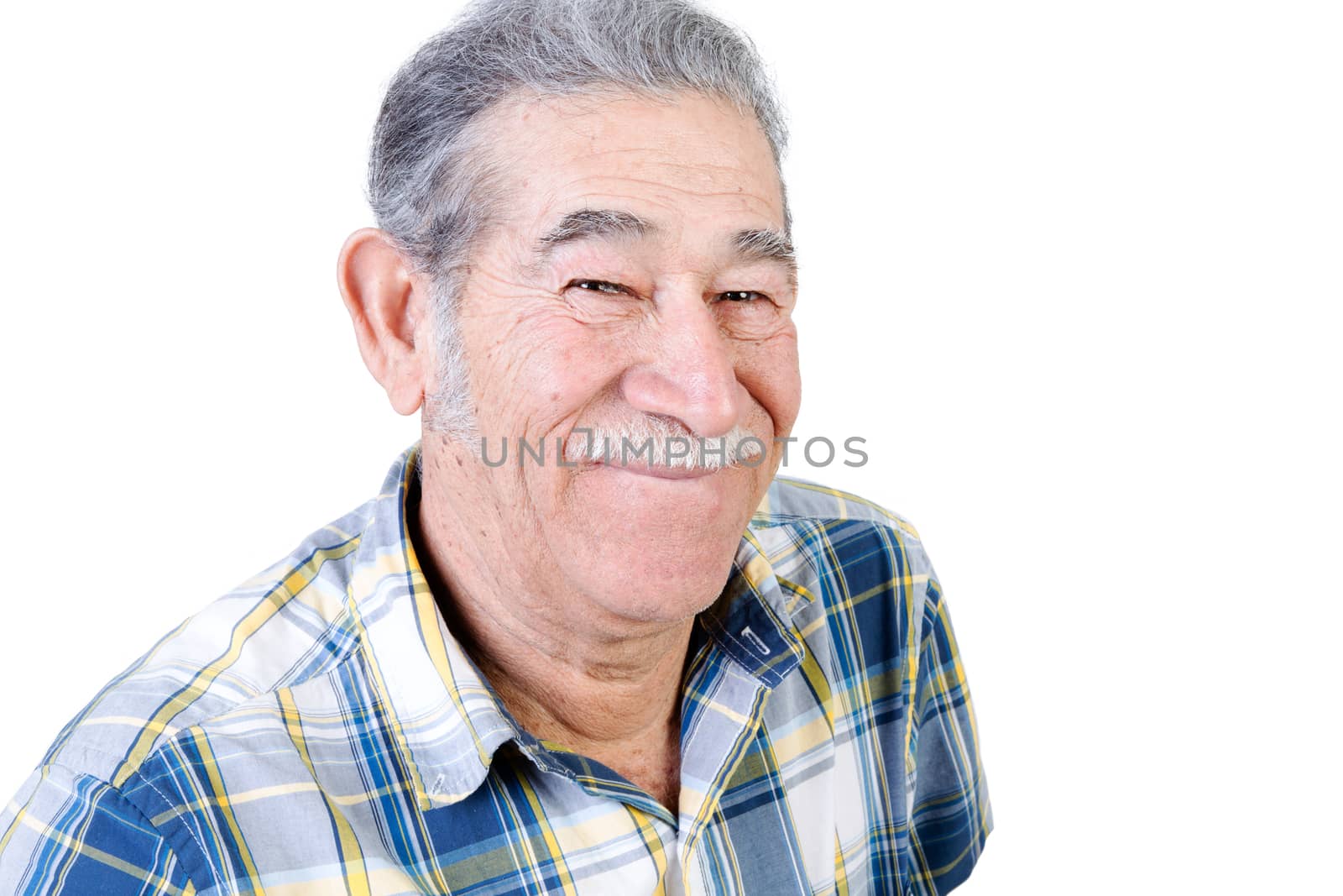 Authentic older Mexican man grinning by coskun