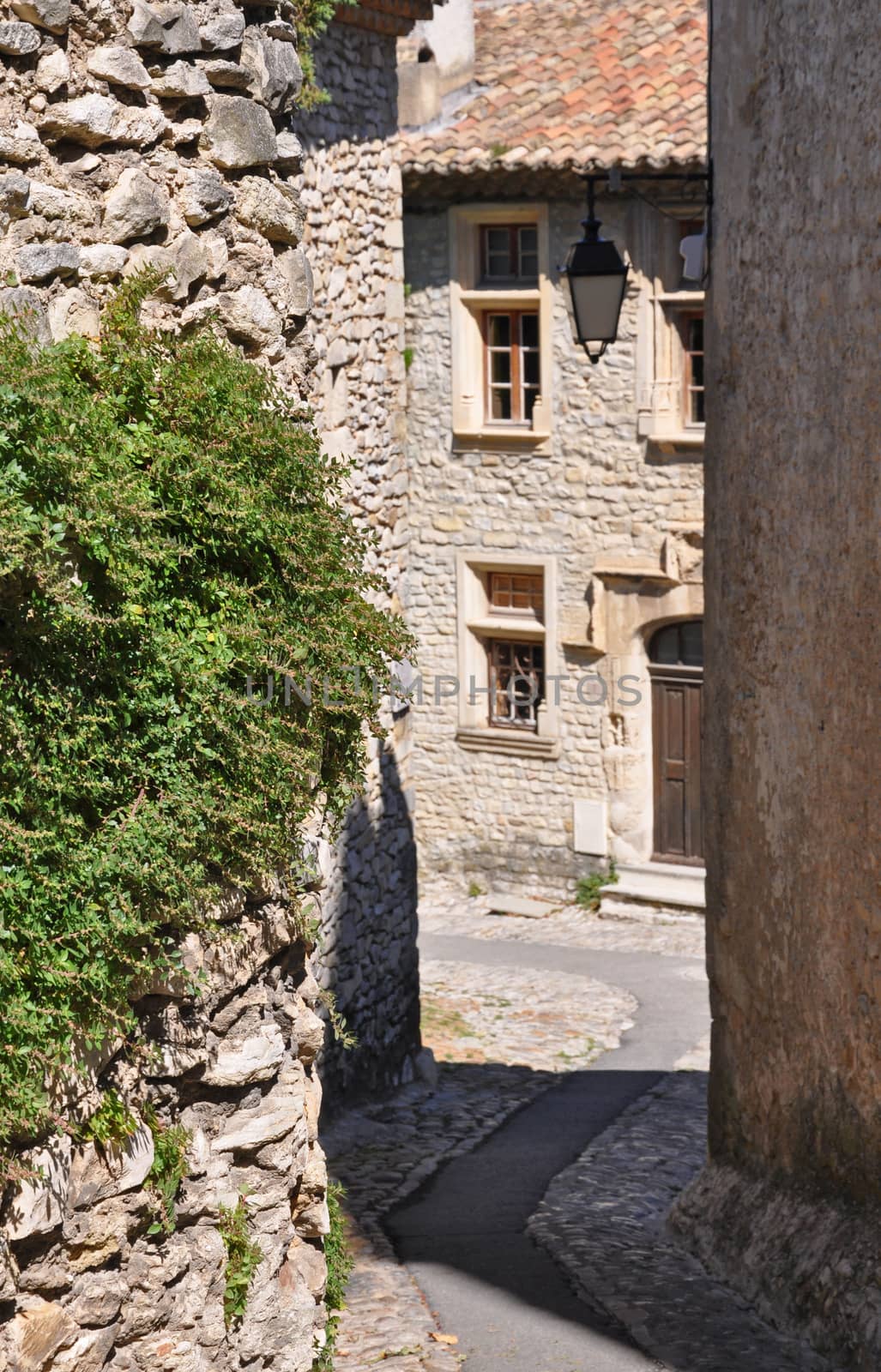 A small lane in the old medieval village of Vaison-la-Romaine, in Provence, France. (taken in the Haute Ville)