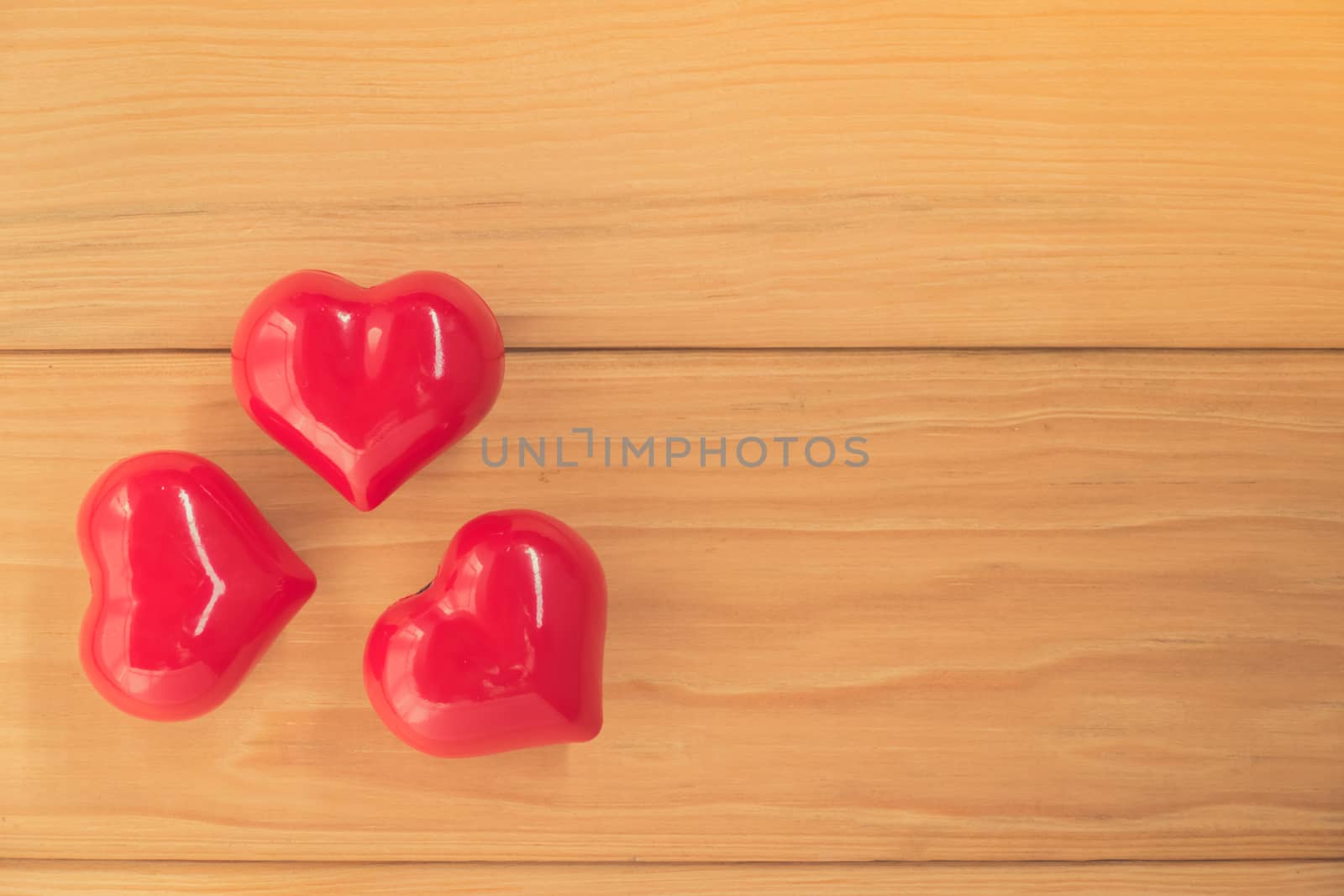 red heart on rustic wood with copy space, valentine background