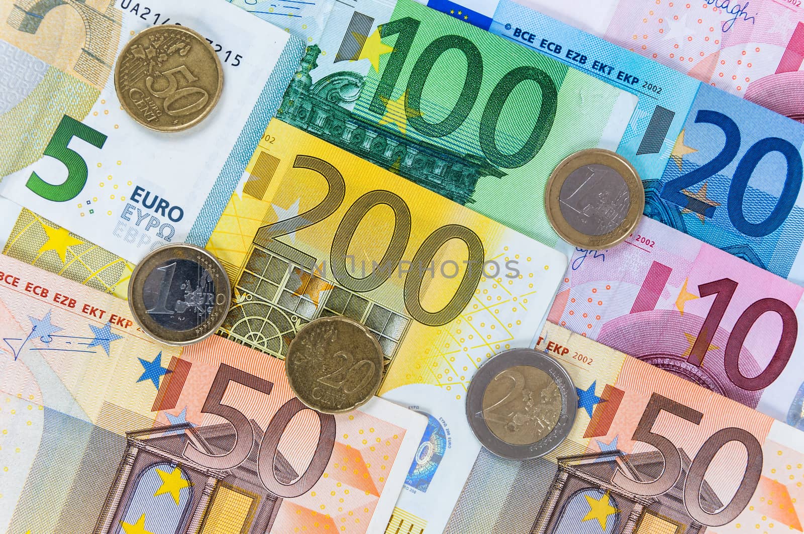 Background of euro banknotes and coins by mkos83