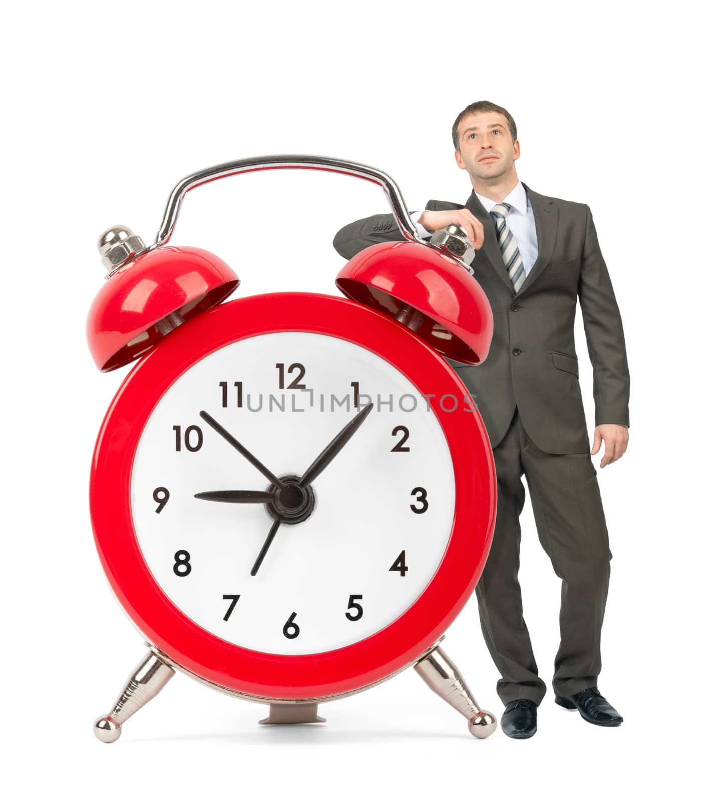 Businessman with big alarm clock by cherezoff