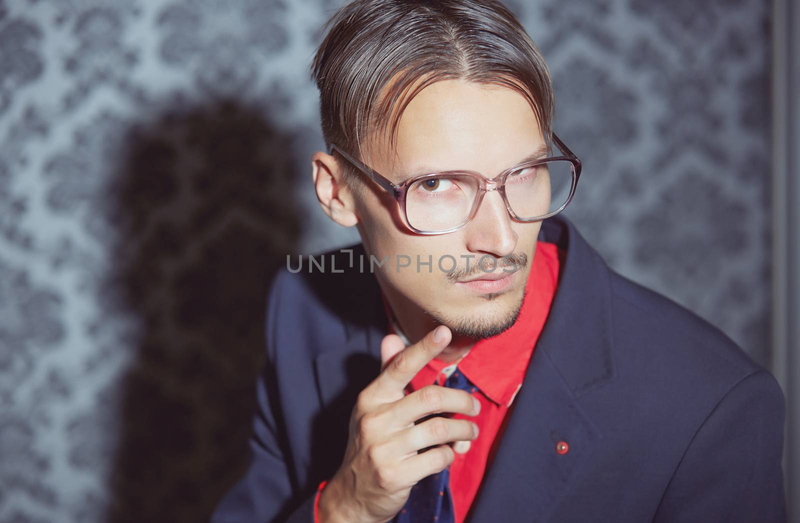 Hipster businessman in glasses. Horizontal photo