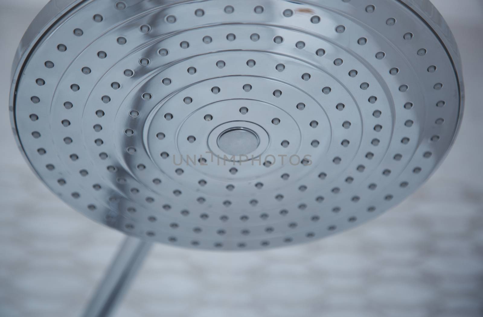 Close-up view on a modern metal shower. Horizontal photo