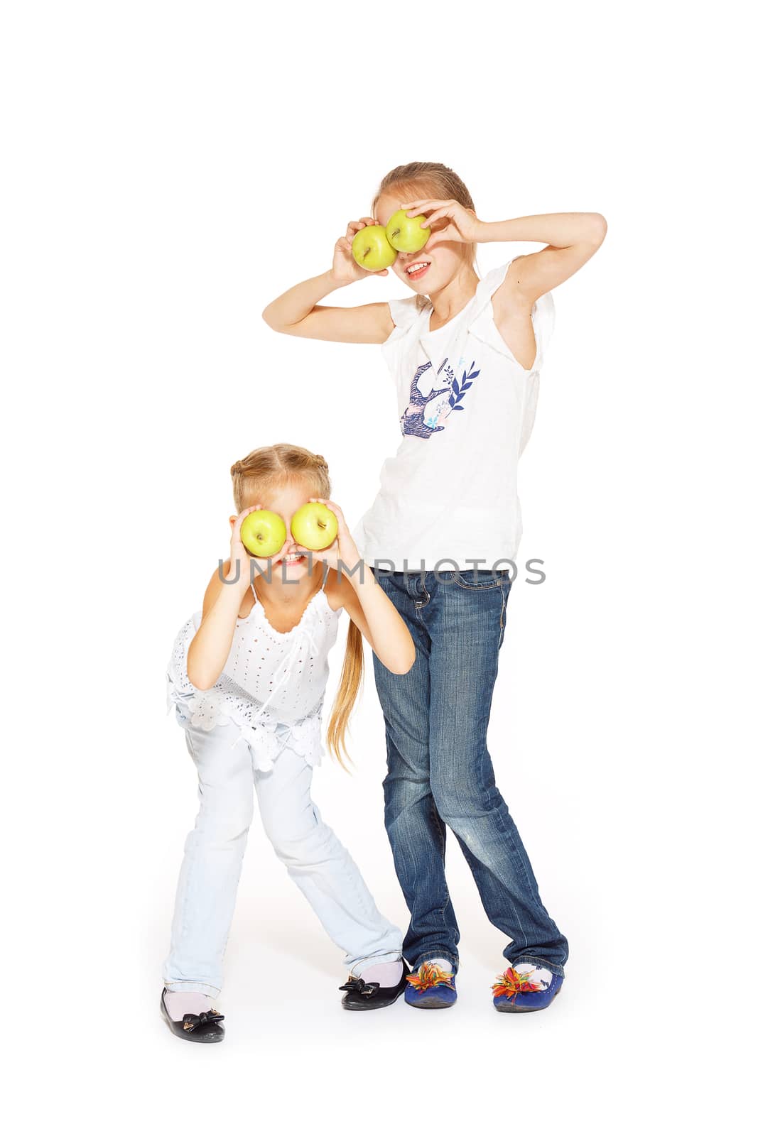 Beauty young girls with fresh apples. Healthy lifestyle. Happiness. White background.