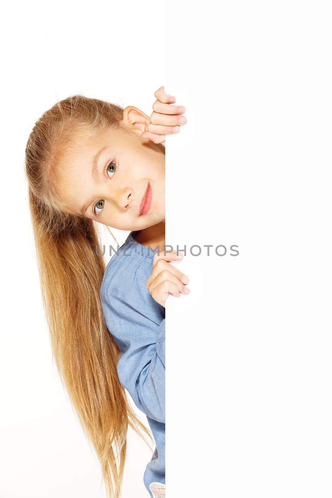 Little girl with blank sign isolated on white