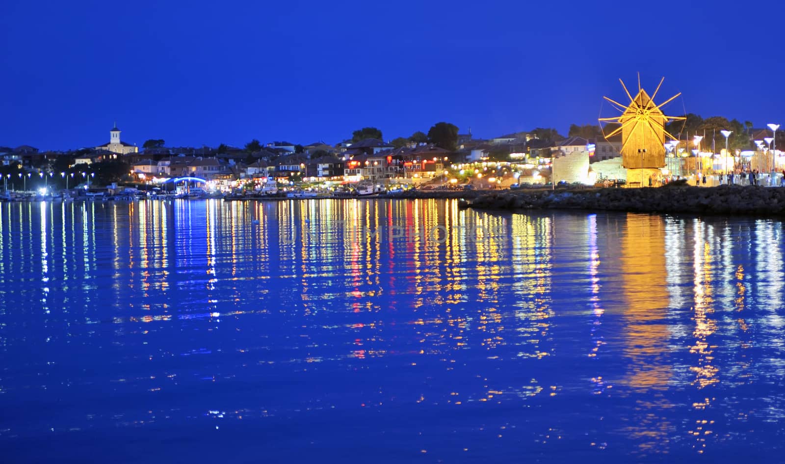 Wooden windmill in Nessebar at night