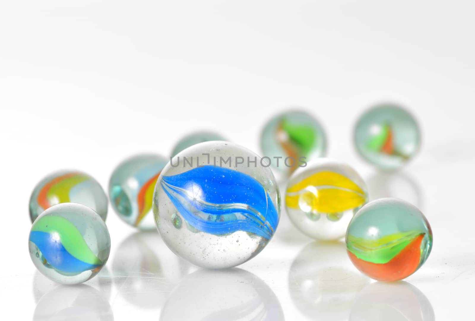 Close up image of assorted marbles