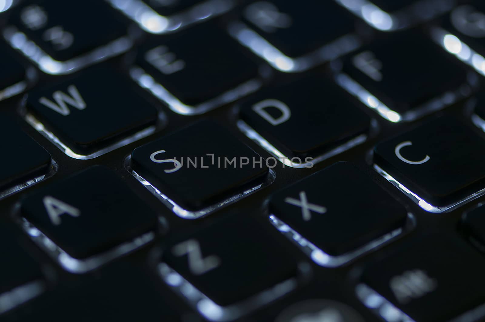 Illuminated keyboard. Focus on WASD keys by remusrigo