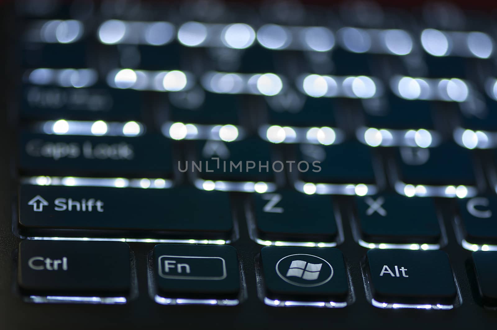 Illuminated keyboard. Focus on Ctrl Fn Alt keys by remusrigo
