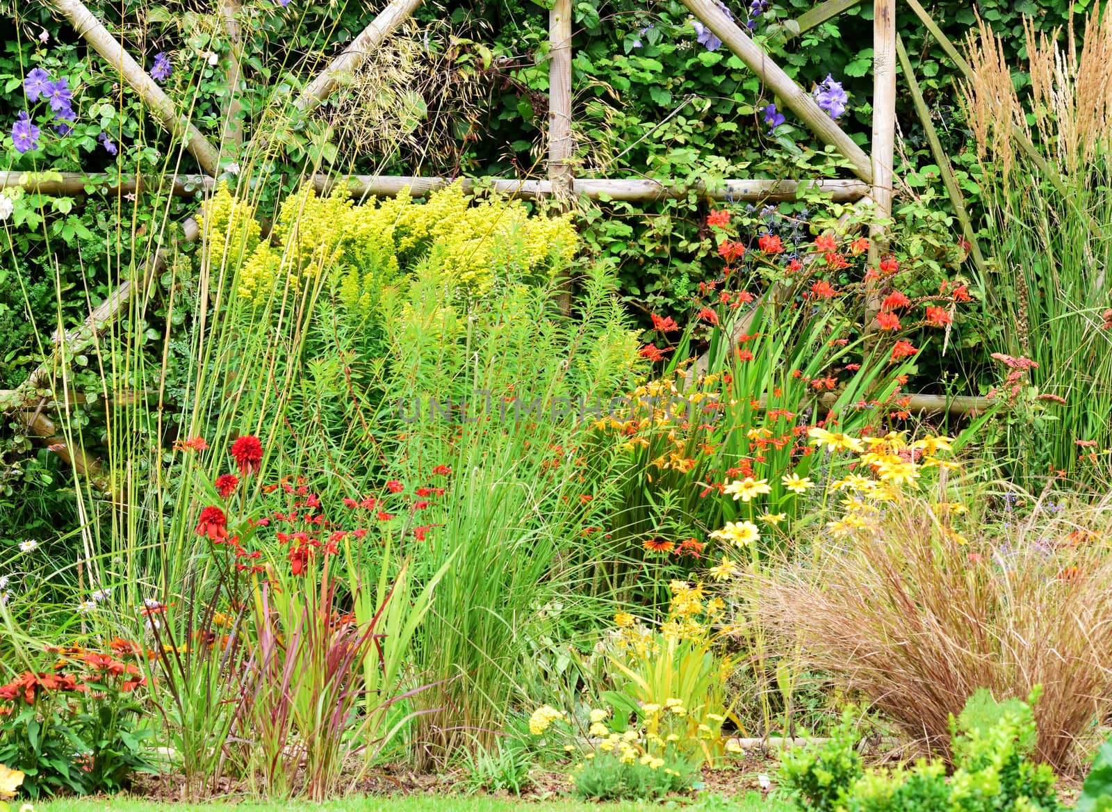 Garden scene resonant of such a sight all over the world where people sculpt,design and tend thier little piece of heaven.