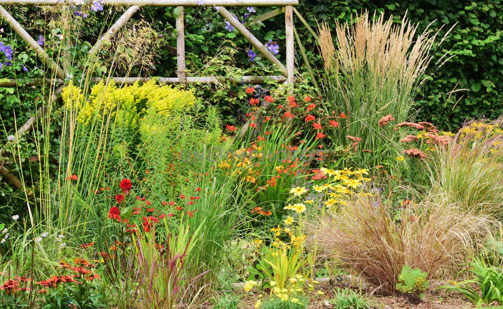 Garden scene resonant of such a sight all over the world where people sculpt,design and tend thier little piece of heaven.