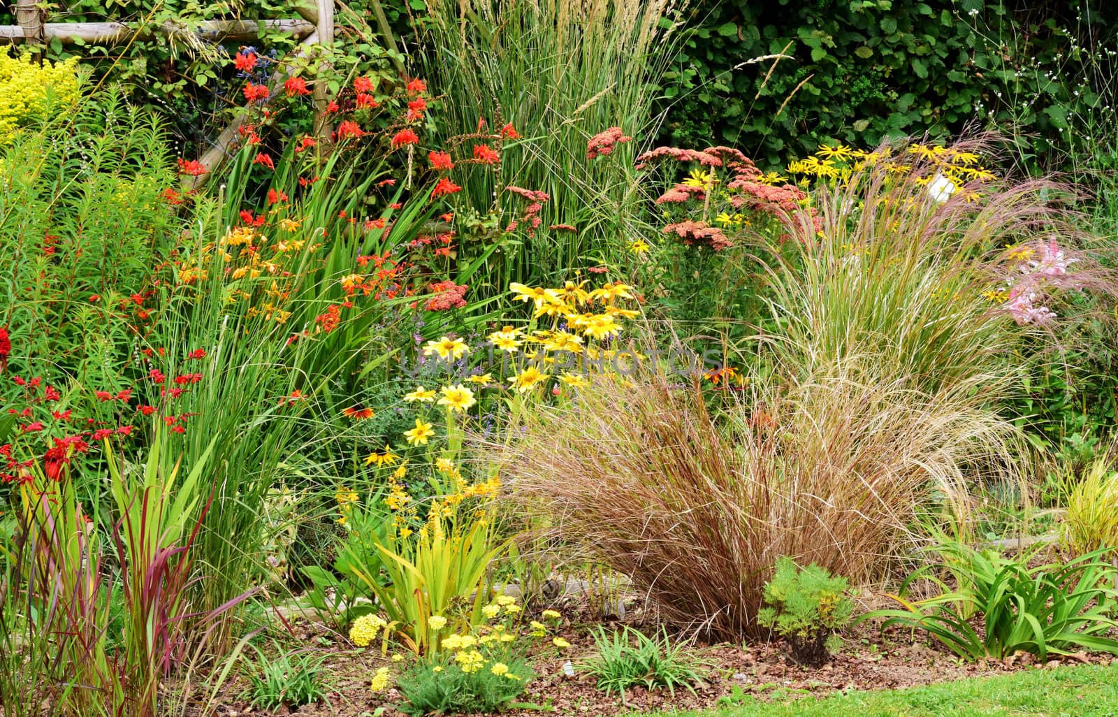 Garden scene resonant of such a sight all over the world where people sculpt,design and tend thier little piece of heaven.