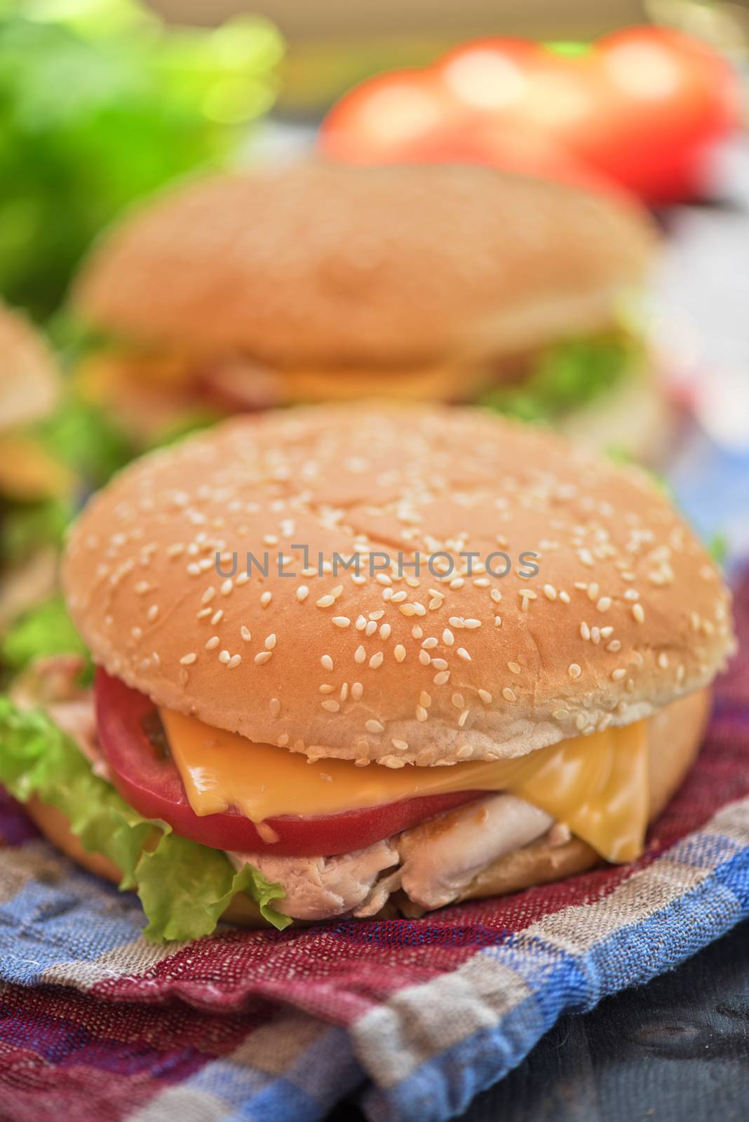 Closeup of home made burgers on wooden table