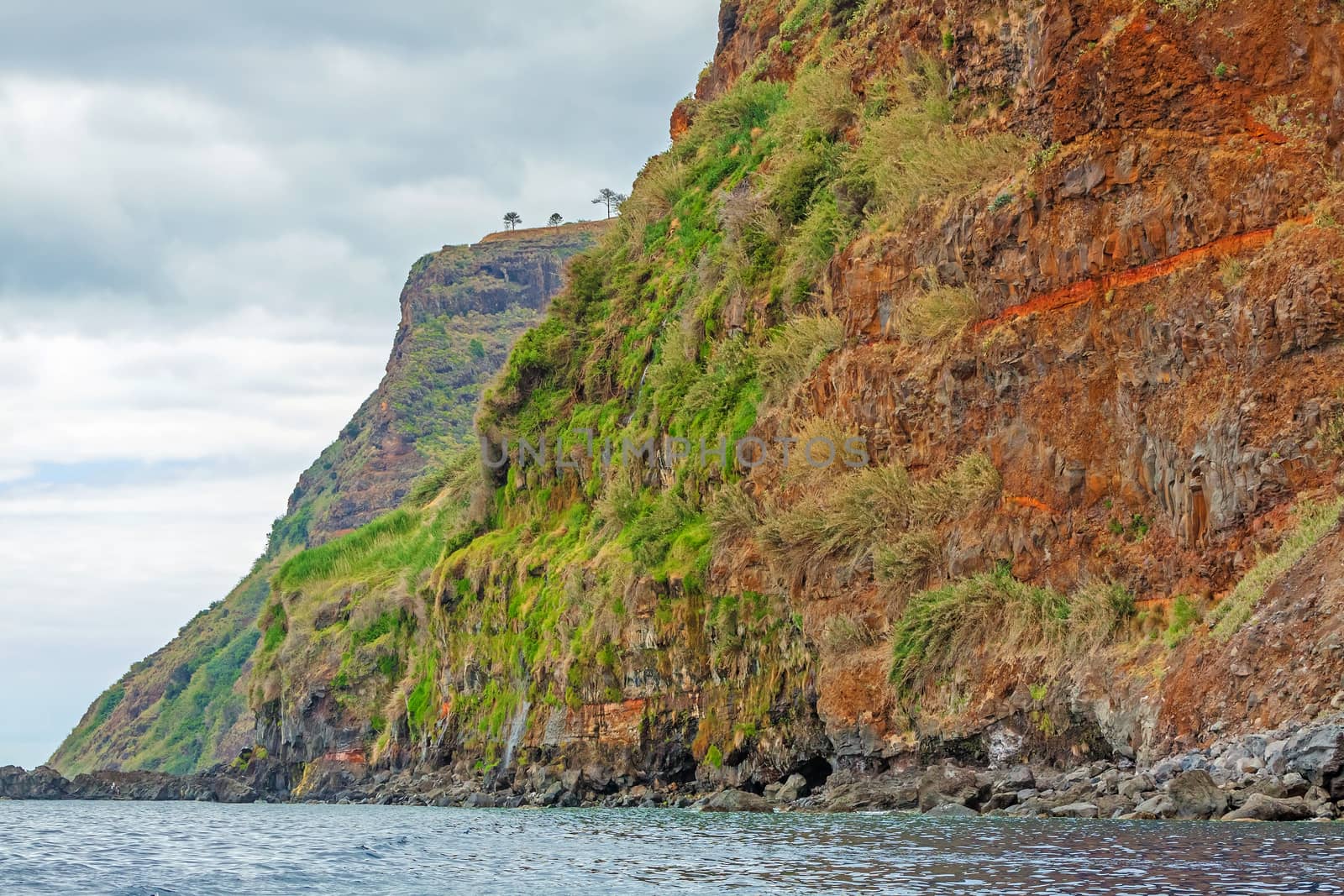 Colorful rocky cliff coast of Madeira between Jardim do Mar and Calheta